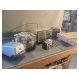 Mixed Household Collection with Clocks, Camera, and Accessories