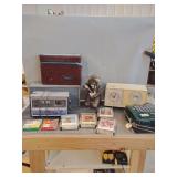 Audio Equipment and Accessories Including 8-Track Tapes, Radios, and a Carrying Case