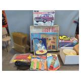 Collectibles Including Kohner Busy Box, MPC New Chevette Model Kit, and Disney Bolt Book