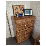 Five-Drawer Chest of Drawers with Assorted Decor and Electronics