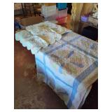 Floral Patchwork Quilt with Scalloped Edges and Lace Detail