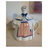 Figural Ceramic Teapot Depicting Woman in Bonnet and Apron