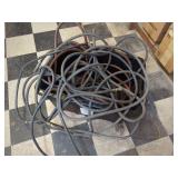 Air Compressor Hoses with Fittings in Storage Bin