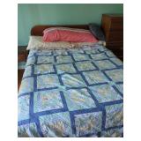 Patchwork Quilt with Floral and Geometric Patterns