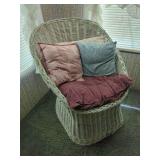 White Wicker Barrel Chair with Assorted Decorative Pillows