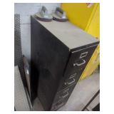 HON Four-Drawer Metal Filing Cabinet with Assorted Safety Equipment and Apparel