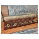 Carved Wooden Mancala Game Board with Playing Stones