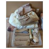 Household Linens and Textiles in Storage Bin