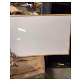 A QUARTET 23x35 DRY-ERASE BOARD- WITH AN OAK FINISH-