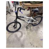 This is a Kent 20" Ambush BMX Bike with a black and white frame.