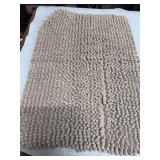 GRAY BATHROOM RUG.