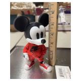 URBAN MICKEY MOUSE WEARING NIKE HOODIE AND SHOES.