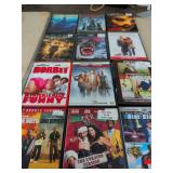 12 DVD MOVIES - BAD BOYS - CUJO - NORBIT - AND ETC