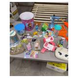 A BOX  OF TOYS- NERF GUN-  BUBBLE GUNS- SHAPE IT SAND- FLOOF BUCKET- JEWELRY AND ETC.-