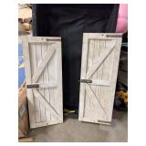 2- DISTRESSED WHITE AND BROWN RUSTIC BARN DOORS- WALL DECOR PIECES- MEAS.- 31x12-