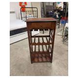 A MAHOGANY WINE RACK TABLE- MEAS.- 34”t x 19”w x 15”l