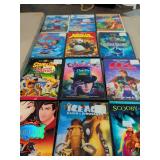 12 KIDS DVD MOVIES - MULAN - SCOOBY DOO - LILO & STITCH -; SMURFS AND ETC