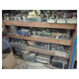 Assorted Hardware and Plumbing Supplies in Wooden Shelving Unit