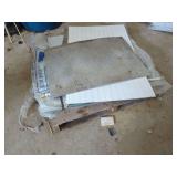 Metal Siding Panels and Diamond Plate Sheet on Wooden Pallet