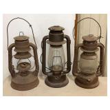 Group of Three Metal Kerosene Lanterns Including Rayo