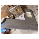 L-Shaped Countertop with Integrated Double Basin Sink