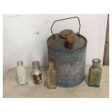Galvanized Metal Fuel Canister and Assorted Glass Bottles