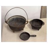 Cast Iron Cookware Grouping with Cauldrons and Skillet