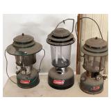 Three Coleman Outdoor Lanterns Including Two Fuel-Burning and One Electric Model