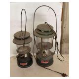 Two Coleman Fuel and Electric Lanterns with Pyrex Globes