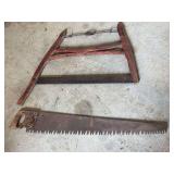 Two-Man Crosscut Saw and Red Painted Wooden Frame Buck Saw