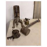 Assorted Metal Workshop Tools and Mechanisms Including Cast Iron Press, Hand Crank Gear Assembly, Brass Blow Torch, and Hand Pump