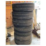 Automotive Tires Assortment Including Michelin and Firestone Brands