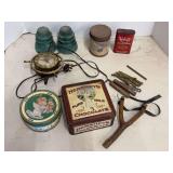 Mixed Group of Tins, Glass Insulators, Metal Rods, and Slingshot