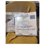 TWO BOXES OF 12 x 12 INCH MIRROR TILES.  6 PER BOX