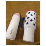 TWO DRINK CONTAINERS.  ONE OWALA AND A RED WHITE AND BLUE TUMBLER