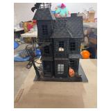 HALLOWEEN CANDLE HOLDER HAUNTED HOUSE- MEAS- 15” TALL
