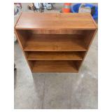 3 TIER BOOKSHELF.  32 INCHES TALL. 30 INCHES WIDE. 12 INCHES DEEP.