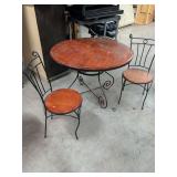 WROUGHT IRON AND WOOD DINING TABLE WITH 2 CHAIRS