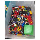 TOTE FULL OF ASSORTED LEGOS.