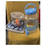 THREE CANDY CONTAINERS AND A ICED TEA DISPENSER