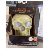 MOVING SCREAMING SKELETON SKULL BATTERY OPERATED
