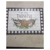 FOUR REVERSIBLE PLACE MATS
