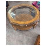 ROUND COFFEE TABLE WITH GLASS TOP.  MISSING SOME MARBLE TRIM. VERY HEAVY AND NICE LOOKING ACCENT PIECE OF FURNITURE.