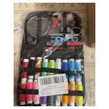SMALL TRAVEL SIZED SEWING KIT.