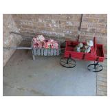 Wooden Garden Decor Pair Including Red Wagon with Child Figurines and Rustic Wheelbarrow Planter with Faux Pink Flowers