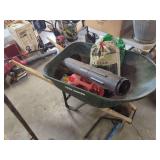 True Temper Wheelbarrow with Yard Care Supplies and Accessories