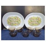 Corelle and Pyrex Dinnerware Assortment Including Floral Platters and Smoke Glass Bowls