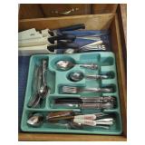 Kitchen Utensil Drawer Contents Including Flatware and Knives