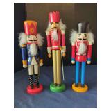 Set of Three Wooden Nutcracker Figures with Hand-Painted Uniforms and Faux Fur Hair
