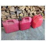 Three Red Molded Plastic Fuel Containers Including Blitz And Scepter Brands